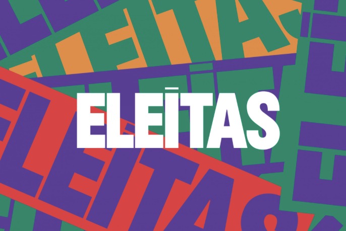 Eleitas escrito em branco no centro com várias vezes a palavra repetida em letras coloridas ao fundo